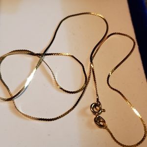 TRADE gold serpentine Chain and 2 pendants with small bag of raw sunstone.